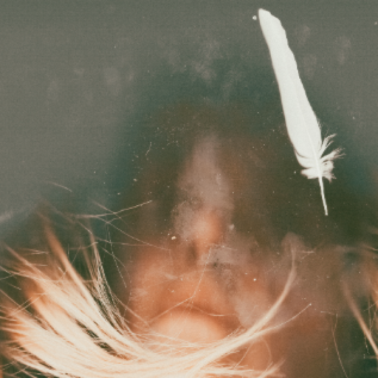 A woman with her face downwards