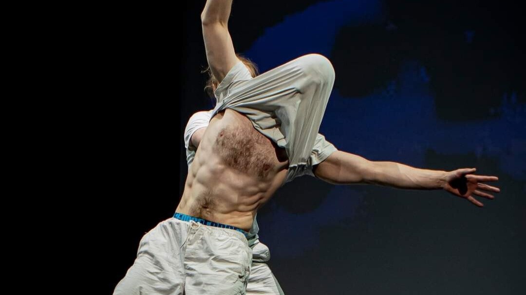Two men wrestling in white clothes