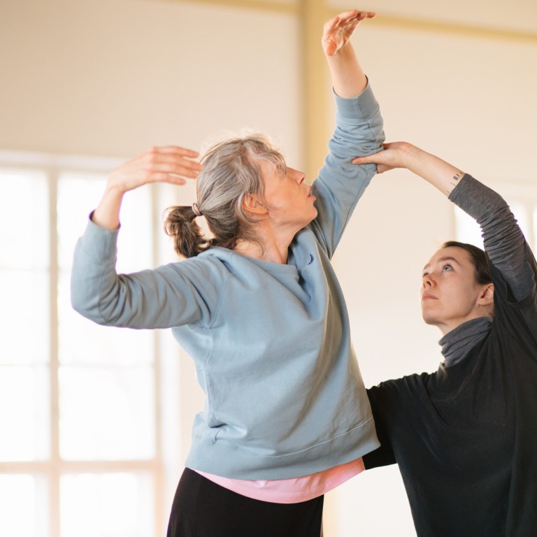 Two women dancing together