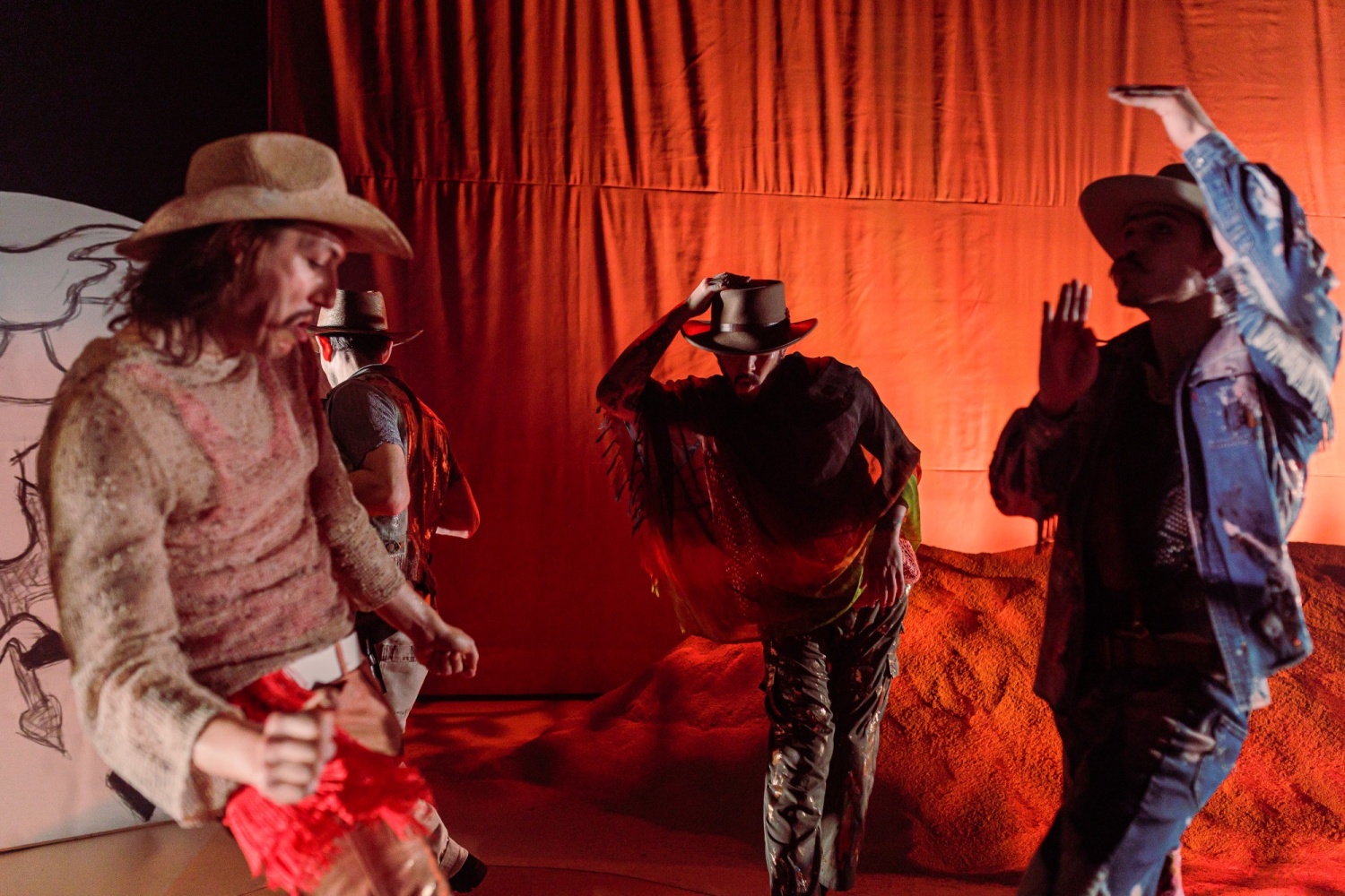 Tre dansande cowboys